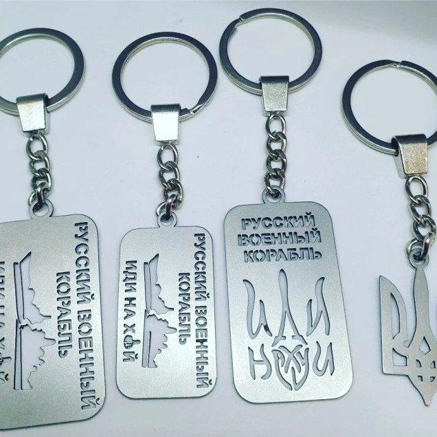 Гравіювання на жетонах Фото